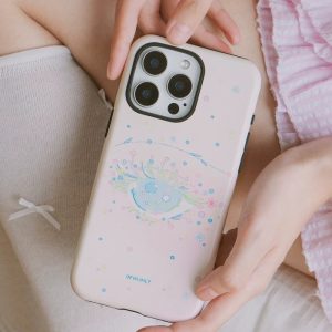 The blush case held on the lap, flower-lashed eye and scattered blossoms in view