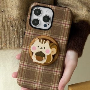 Close view of the chipmunk holder on the tartan case, held in one hand