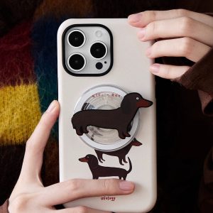 Dachshund iPhone case held in hand against a colorful knitted scarf