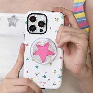 Hands holding the white star-print case with the big pink star holder attached