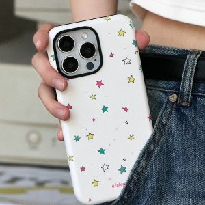 Little stars case without its holder, held against denim jeans
