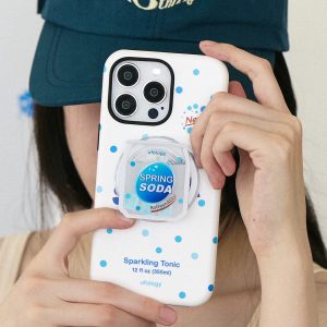 Spring soda case with the soda-cap grip held up in front of a green cap