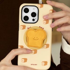 Toast iPhone case showing the golden toast holder on a cream back
