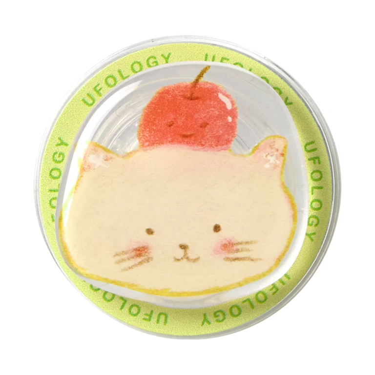 Apple cat MagSafe phone grip, a cream cat face with a red apple on its head