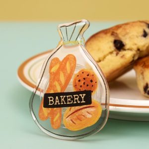 Bakery bag grip leaning on a plate of scones