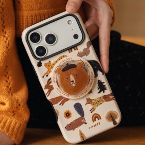 Beret bear grip on the back of a cream case printed with forest animals