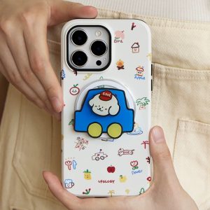 Hand holding the cream doodle case with the blue car holder over overalls