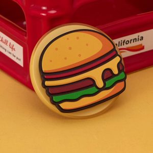Burger grip standing beside a red crate