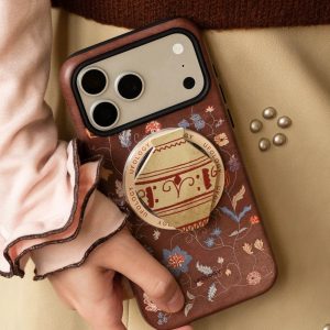 Clay vase grip on the back of a brown floral phone case