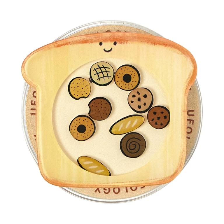 Cookie toast MagSafe phone grip, a slice of toast with a window full of tiny cookies