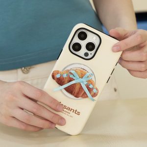 Croissant bow grip on the back of a cream phone case