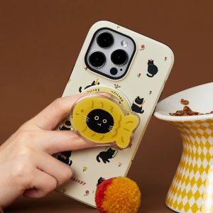 Fish cat grip on the back of a cream case printed with small black cats
