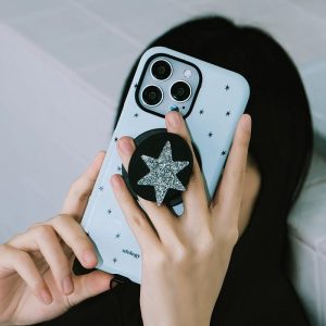 Glitter star grip on the back of a pale blue starry phone case