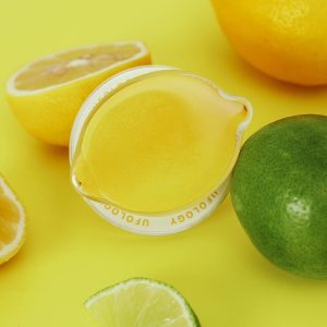 Lemon grip among halved lemons and limes
