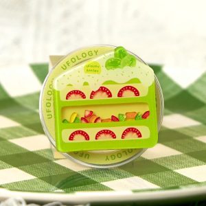 Matcha cake grip on a green gingham cloth
