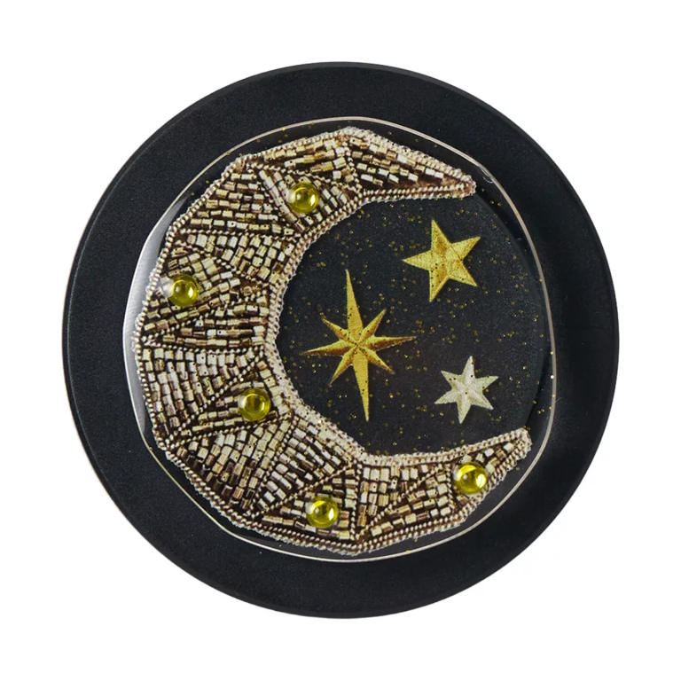 Moon and stars MagSafe phone grip, a beaded golden crescent moon and stars on a black base