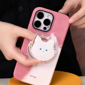 Hand clipping the clear cat-face holder onto the pink white cat case