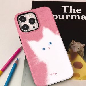 Pink white cat iPhone case without the holder, beside colored pencils and a book