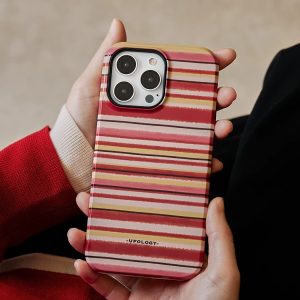 Red and cream striped iPhone case without the holder, held in two hands