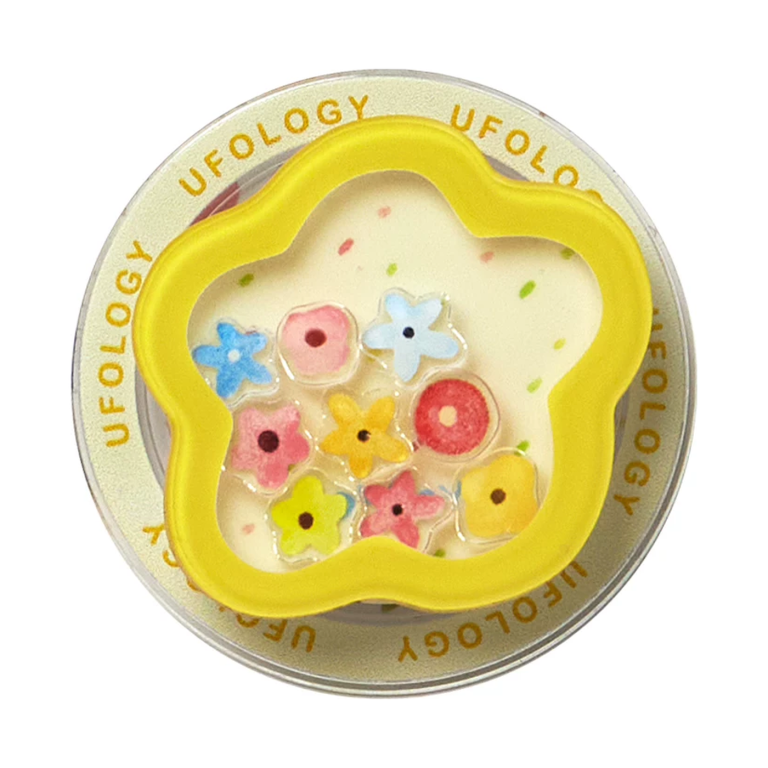 Yellow flower MagSafe phone grip, a yellow flower frame filled with tiny colored blossoms